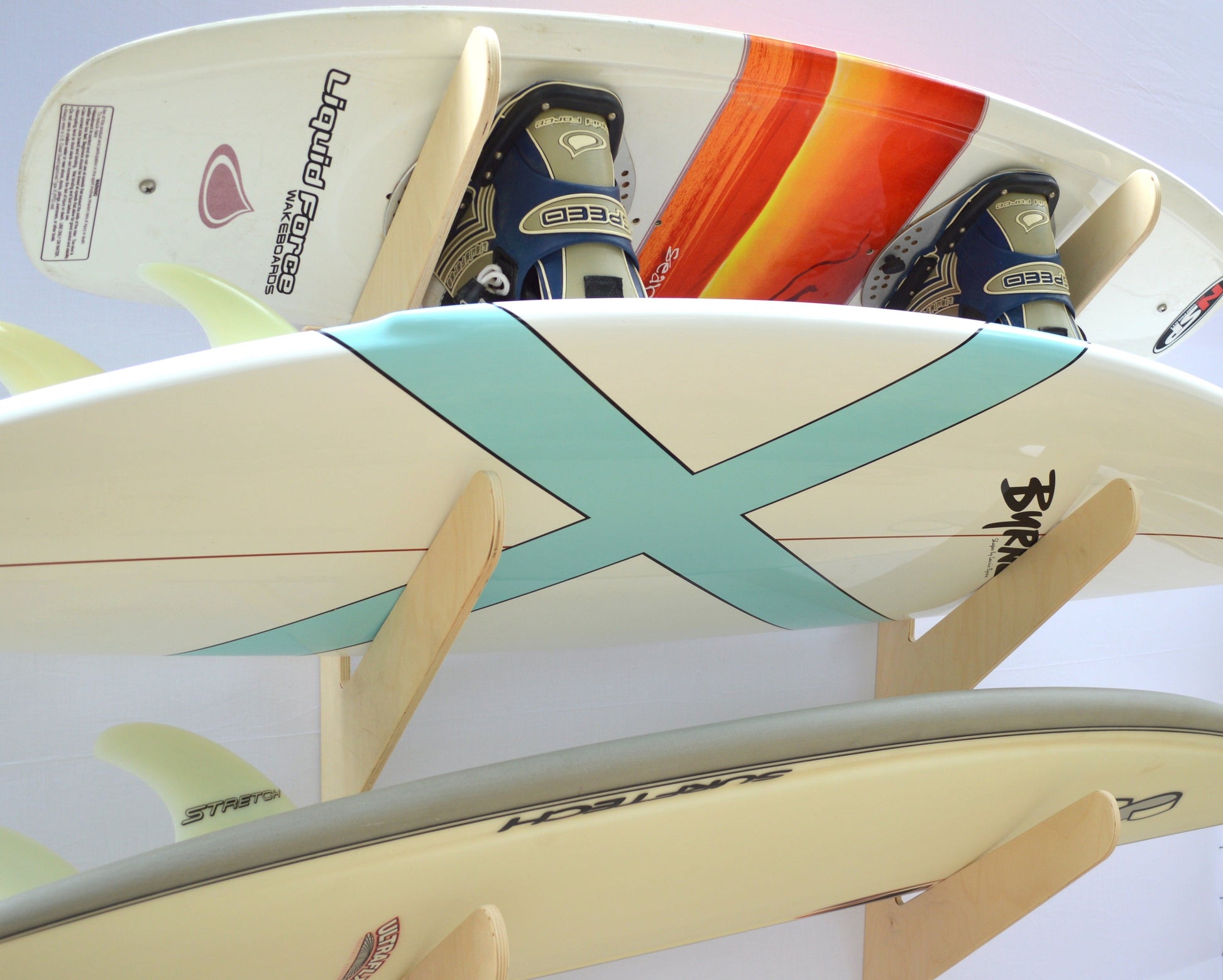 THE EXHIBITOR surfboard wall rack Rado Racks